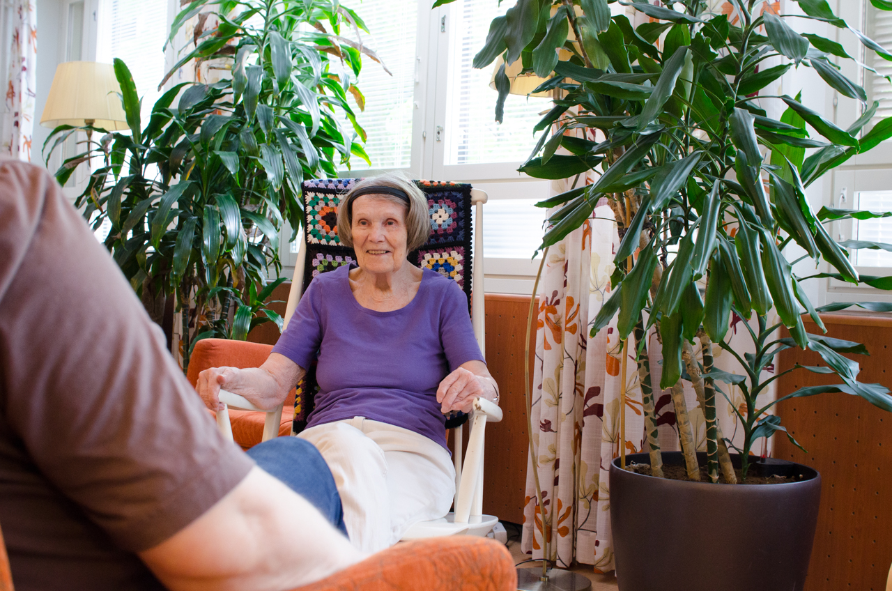 A Finnish lady sitting in a chair